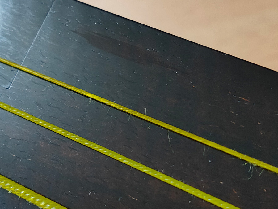 津軽三味線の棹にあったカンベリの一部を埋めて修理